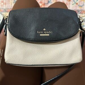 Very chic black and white Kate Spade crossbody purse